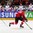 MINSK, BELARUS - MAY 11: Switzerland's Reto Schappi #19 on a breakaway as Belarus' Roman Graborenko #92 chases him down during preliminary round action at the 2014 IIHF Ice Hockey World Championship. (Photo by Andre Ringuette/HHOF-IIHF Images)

